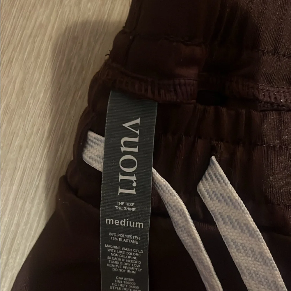 Vuori Men's Sunday Performance Joggers in a brown/oxblood color. - Picture 5 of 5